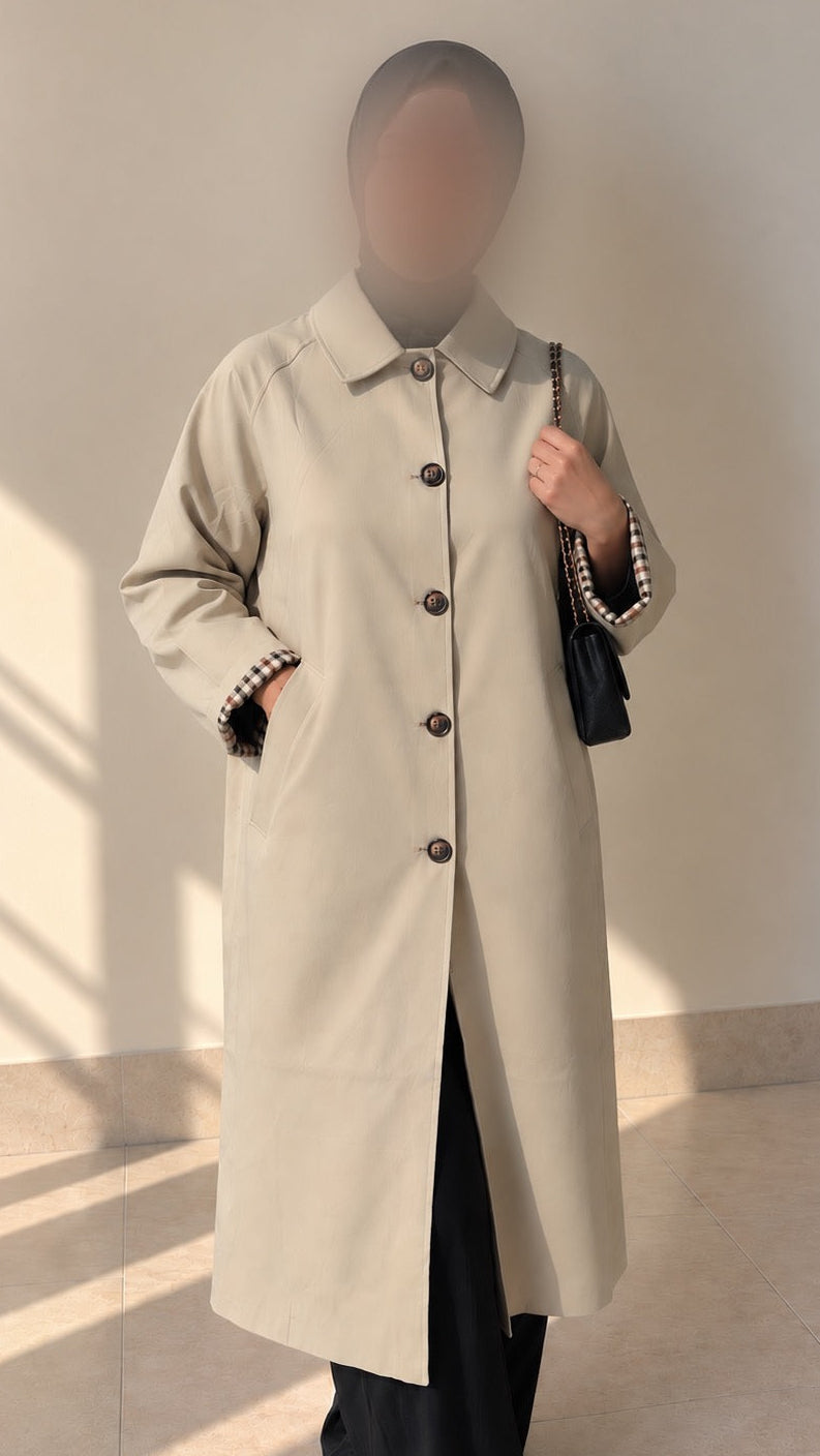 Trench beige long à manches ajustables